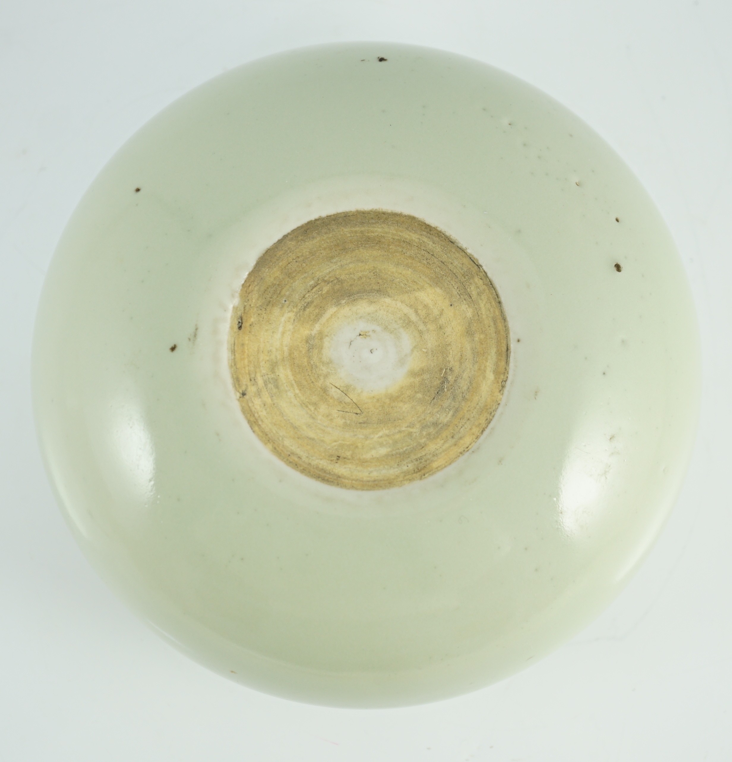 A Chinese celadon glazed water pot or alms bowl, late 19th century, 19cm diameter